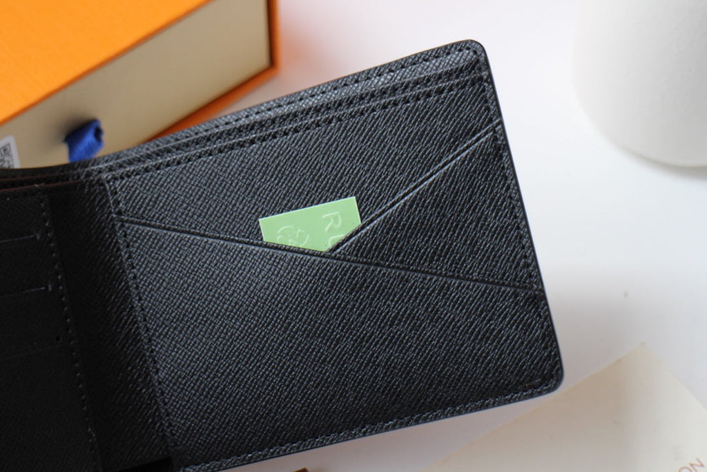 LV 25S MULTIPLE WALLET IN MONOGRAM ECLIPSE COATED CALFSKIN
