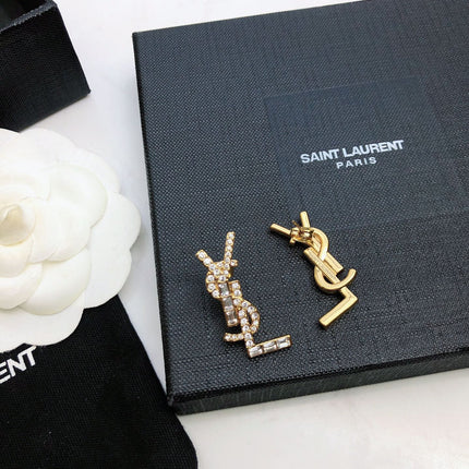 YSL 26S BAGUETTE CRYSTAL LOGO DROP EARRINGS IN GOLD TONE METAL 629136