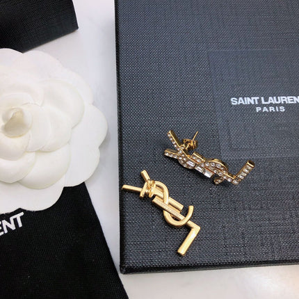 YSL 26S BAGUETTE CRYSTAL LOGO DROP EARRINGS IN GOLD TONE METAL 629136