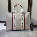 LAGRE WOODY TOTE BAG 45 IN BEIGE LINEN CANVAS BLACK WEBBING LOGO EMBROIDER RED CALFSKIN