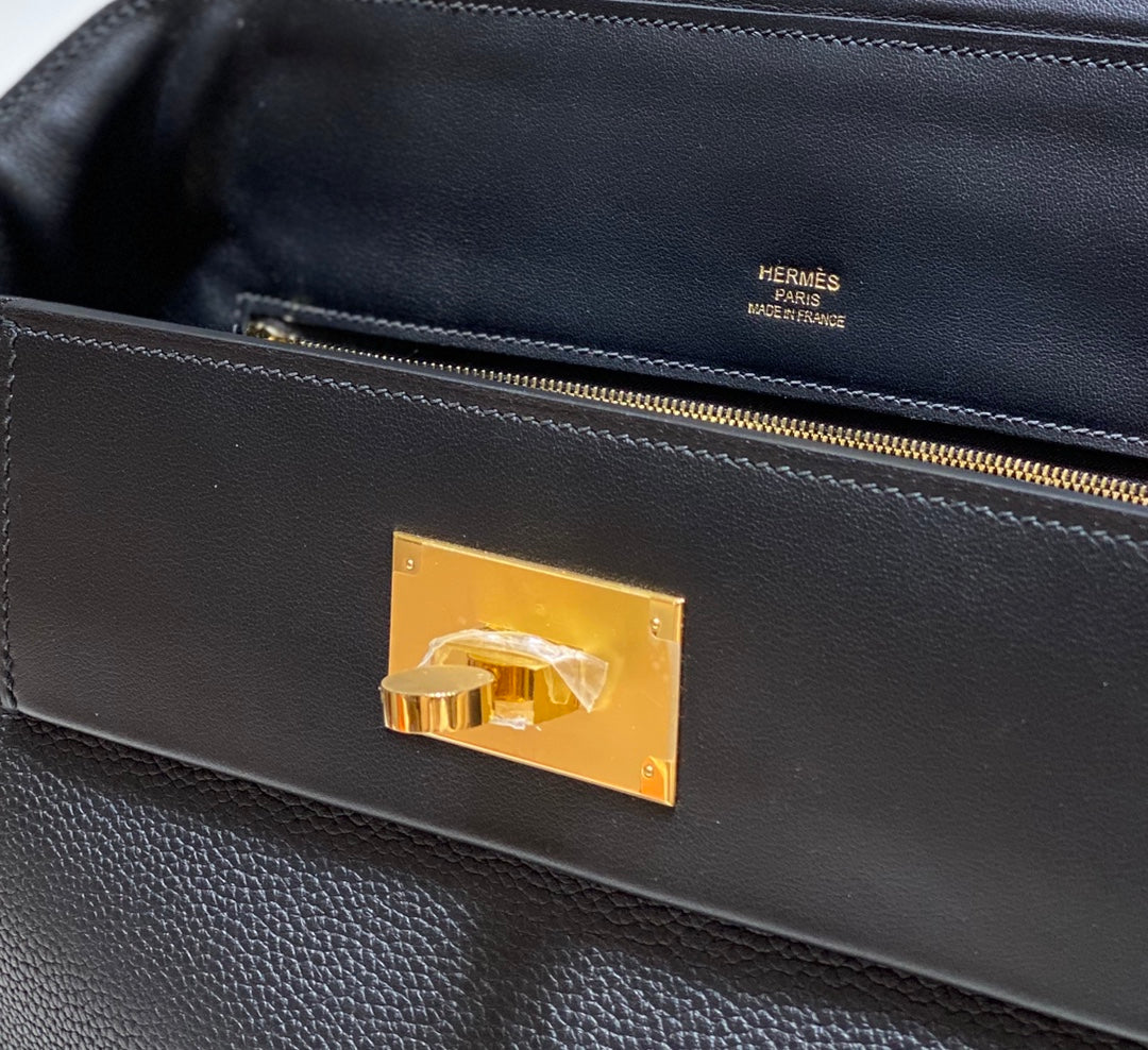 HM 26S 24/24 29MM IN BLACK EVERCOLOR CALFSKIN GOLD KELLY BUCKLE