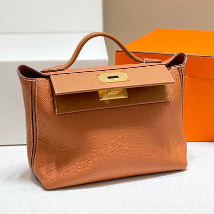 HM 26S 24/24 29MM IN ORANGE EVERCOLOR CALFSKIN GOLD KELLY BUCKLE