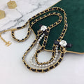 CHANEL 25S CHAIN BELT IN WHITE PEARL AND BLACK CALFSKIN 614403