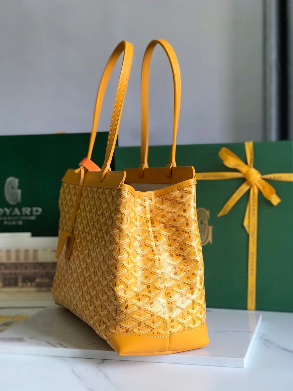 BELLECHASSE BIAUDE PM BAG 36 IN YELLOW GOYARDINE CANVAS AND CALFSKIN TRIM