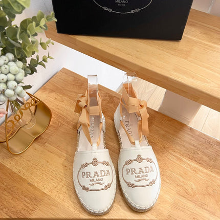 PRADA 26S LACE UP ESPADRILLE FLATS IN CREAM WHITE CALFSKIN