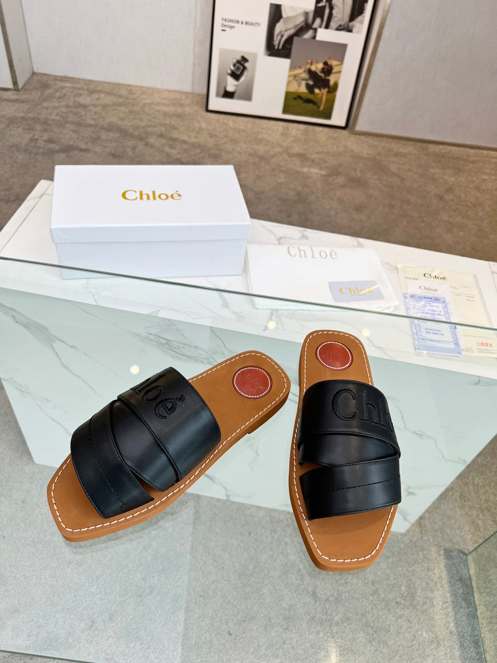 WOODY MULE IN BLACK LAMBSKIN WITH EMBROIDERED LOGO