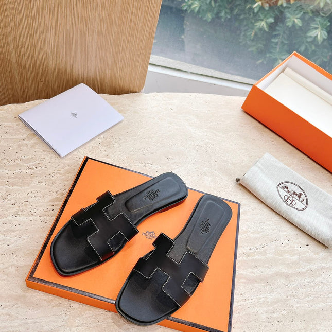 0RAN SANDAL IN BLACK CALFSKIN 202622