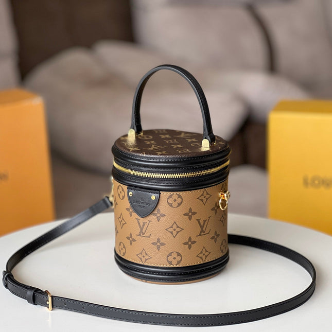 LV 25S PETIT NOE  16 IN BROWN MONOGRAM COATED CANVAS LEATHER TRIM BLACK
