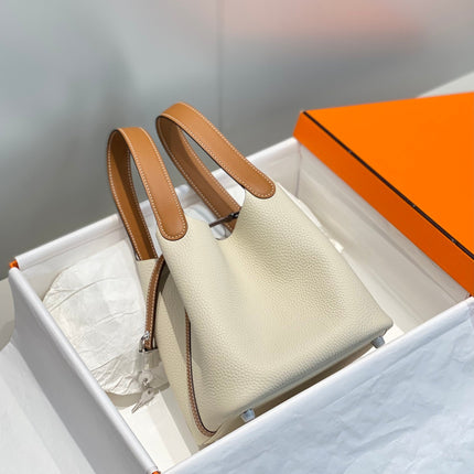 HERMES 25S PICOTIN LOCK 18 IN BURNT ORANGE AND IVORY CALFSKIN SILVER HARDWARE