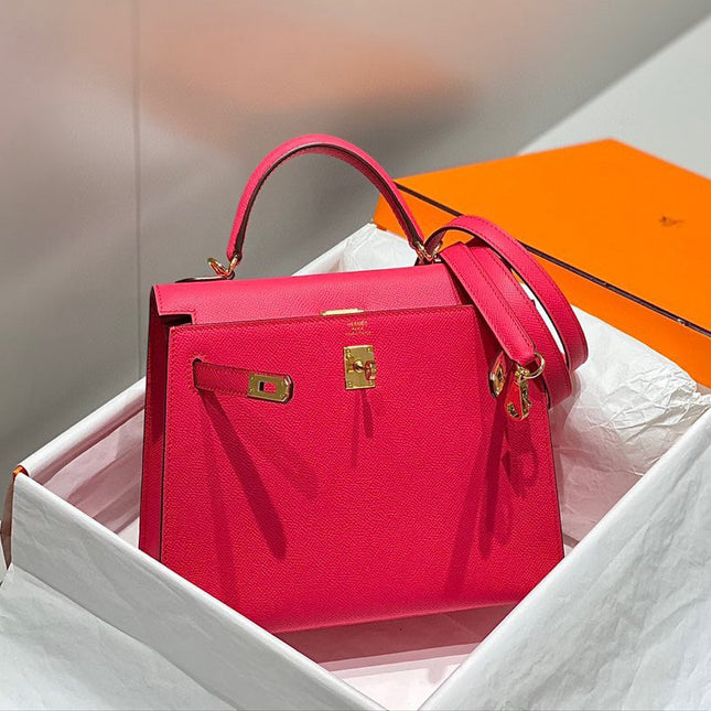 KELLY 25CM IN ROSE TYRIEN SWIFT CALFSKIN GOLD HARDWARE