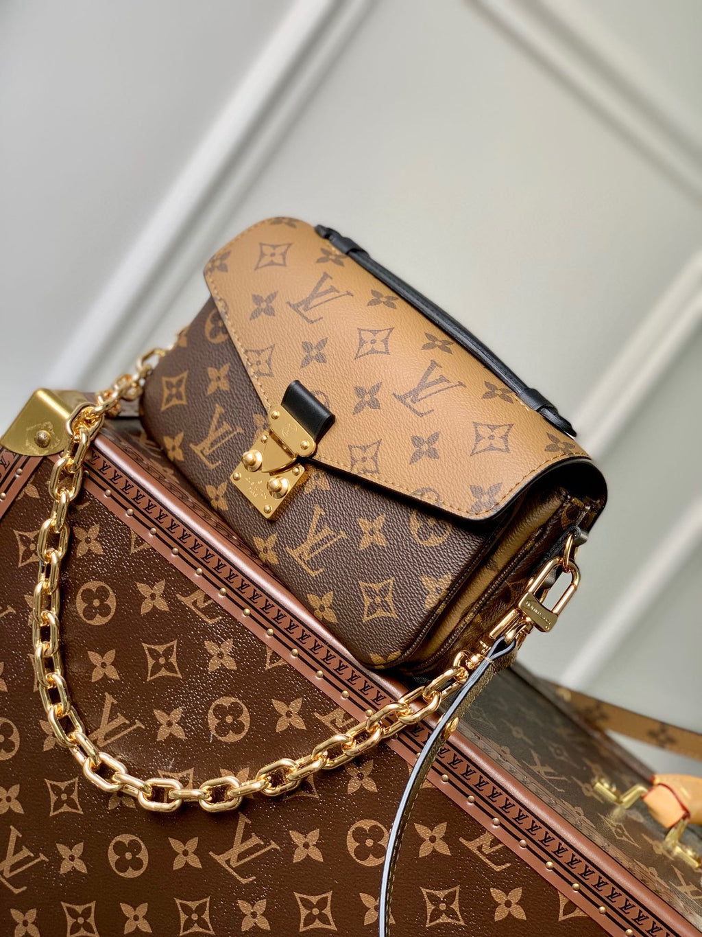 POCHETTE MÉTIS EAST WEST 21.5 IN BROWN MONOGRAM COATED CANVAS AND CALFSKIN