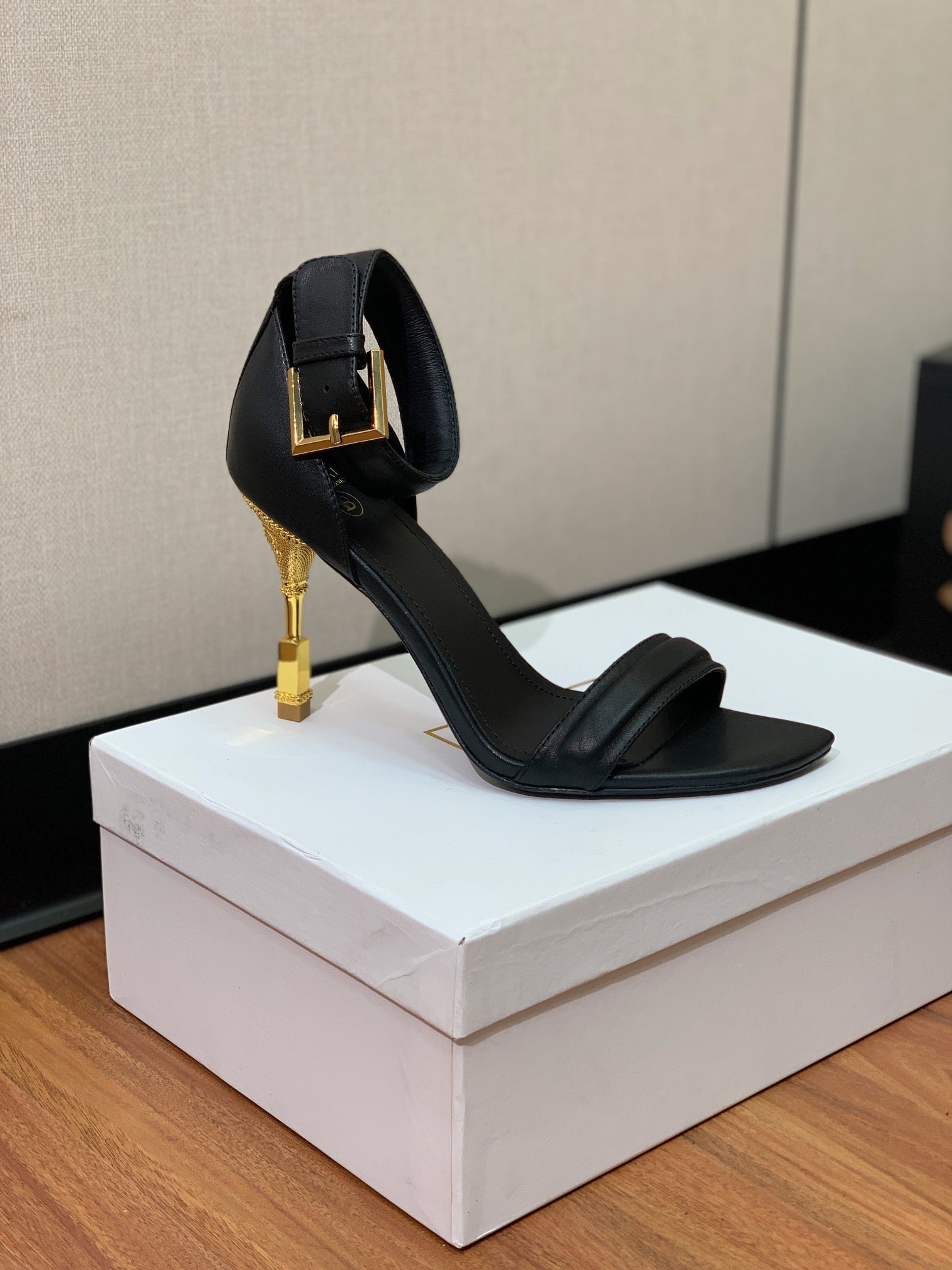 BALMAIN 26S METAL-HEEL SANDALS 105 MM IN BLACK CALFSKIN