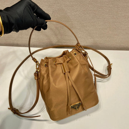 BUCKET BAG 19 IN RUSSET BROWN RE-NYLON AND CALFSKIN HANDLE