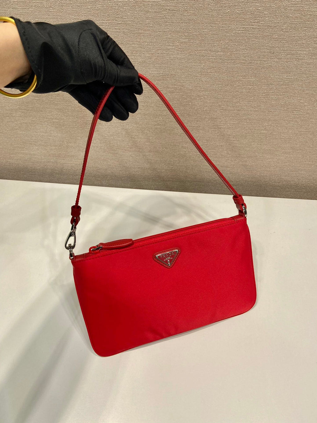 SHOULDER BAG 24 WITH TRIANGLE LOGO IN PASSION RED RE-NYLON FABRIC