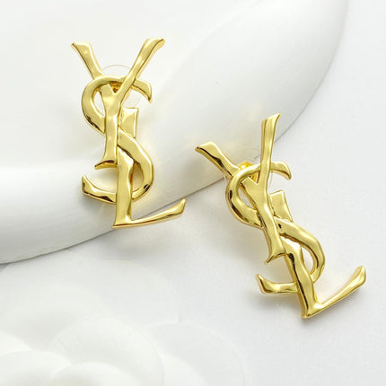 YSL 26S MONOGRAM DROP EARRINGS IN GOLD TONE METAL 629923