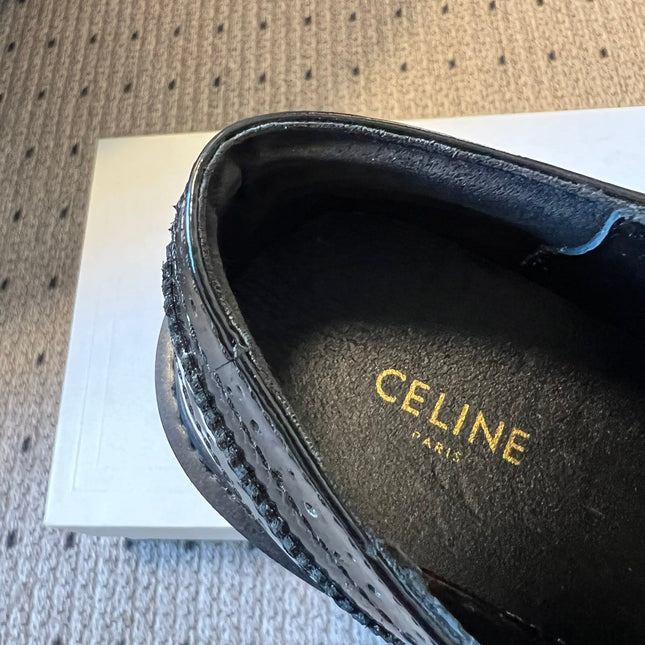 CELINE 26S SAINTNJORD TASSEL LOAFER 50 MM IN BLACK CALFSKIN