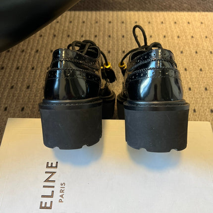 CELINE 26S SAINTNJORD TASSEL LOAFER 50 MM IN BLACK CALFSKIN