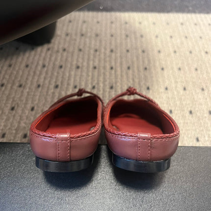 BOTTEGA VENETA 26S FLAT MULES IN DARK RED LAMBSKIN