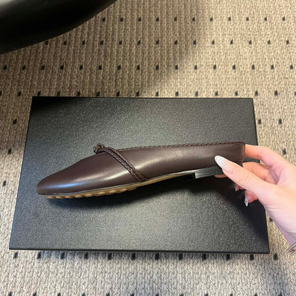 BOTTEGA VENETA 26S FLAT MULES IN DARK BROWN LAMBSKIN