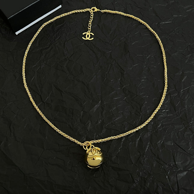 CHANEL 26S DOUBLE C LOGO SPHERE PENDANT CHAIN NECKLACE IN GOLD METAL 630892