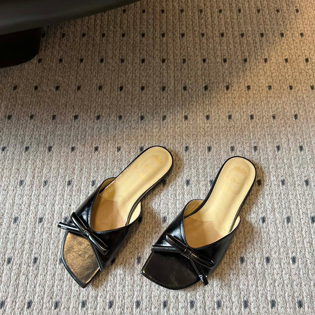 DIOR 26S OBLIQUE BOW MULE IN BLACK CALFSKIN