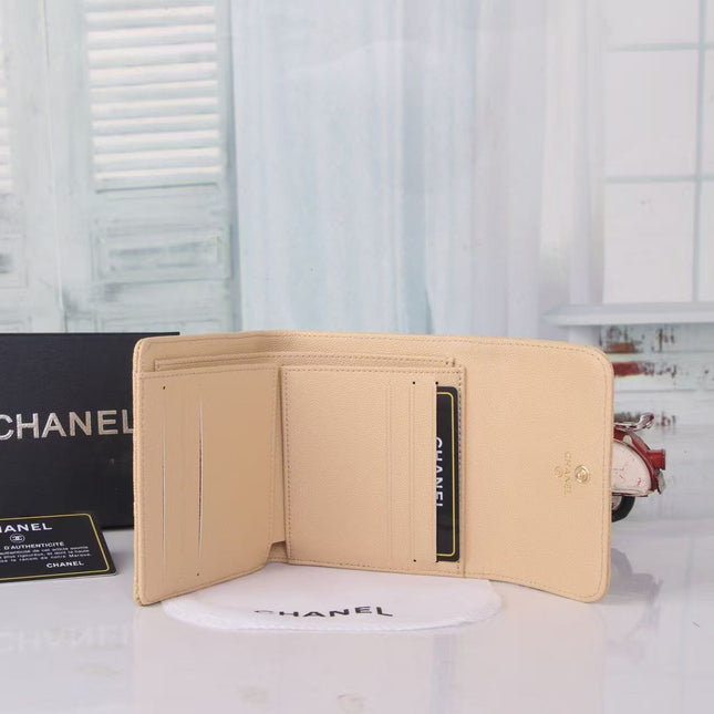 CHANEL FLAP CARD HOLDER IN BEIGE CAVIAR CALFSKIN WITH CRYSTAL EMBOSSED LOGO