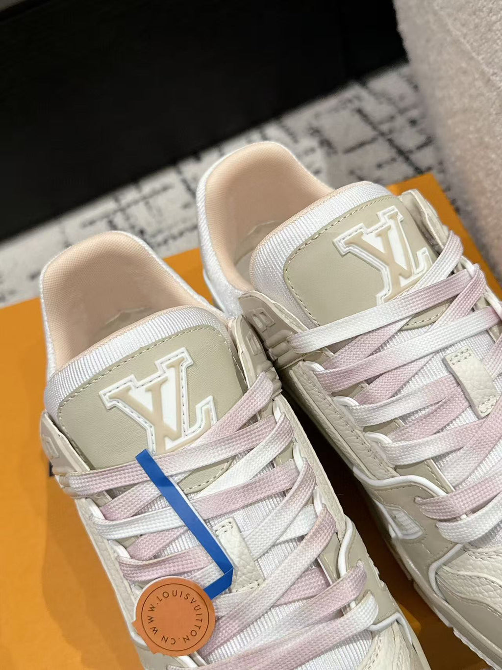 LV TRAINER SNEAKERS IN WHITE CALFSKIN