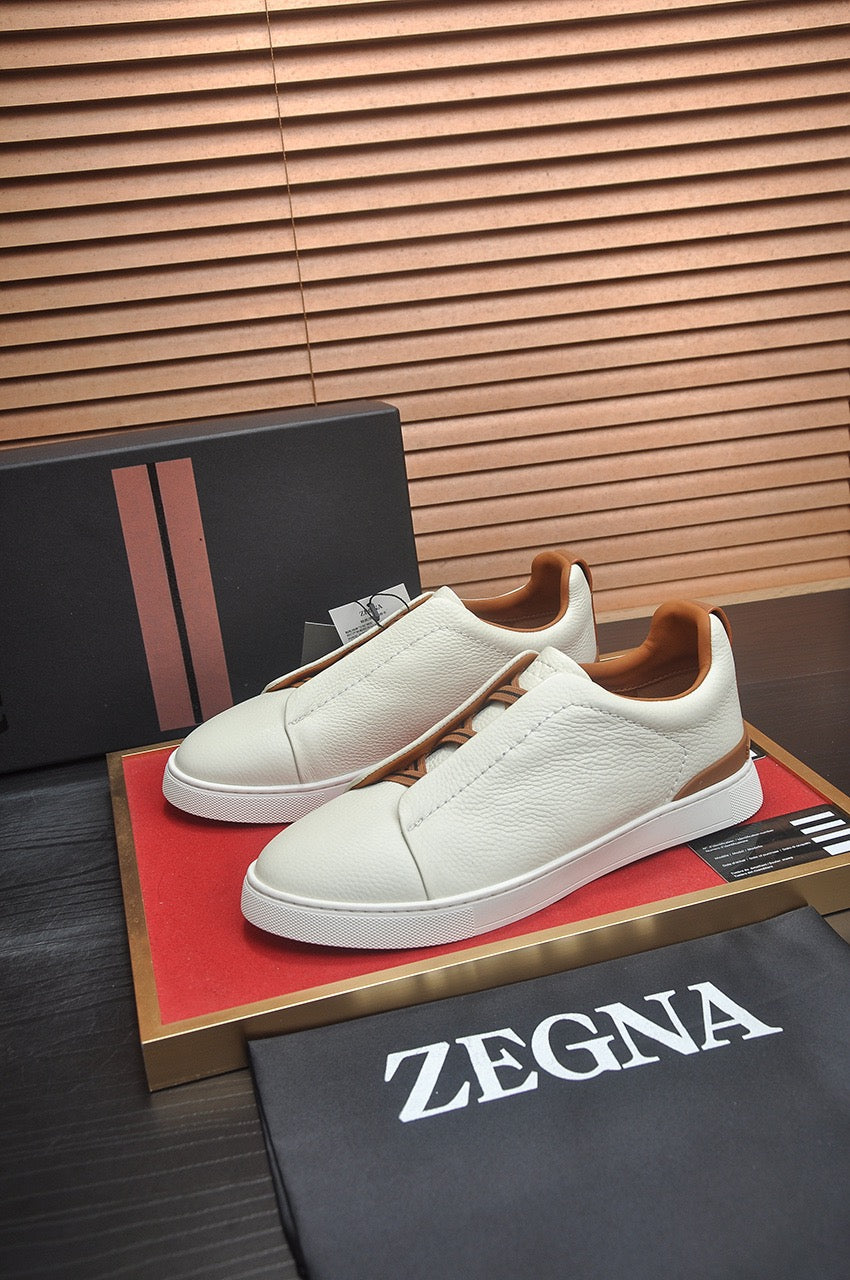 LOW-TOP SNEAKERS IN WHITE GRAINED CALFSKIN