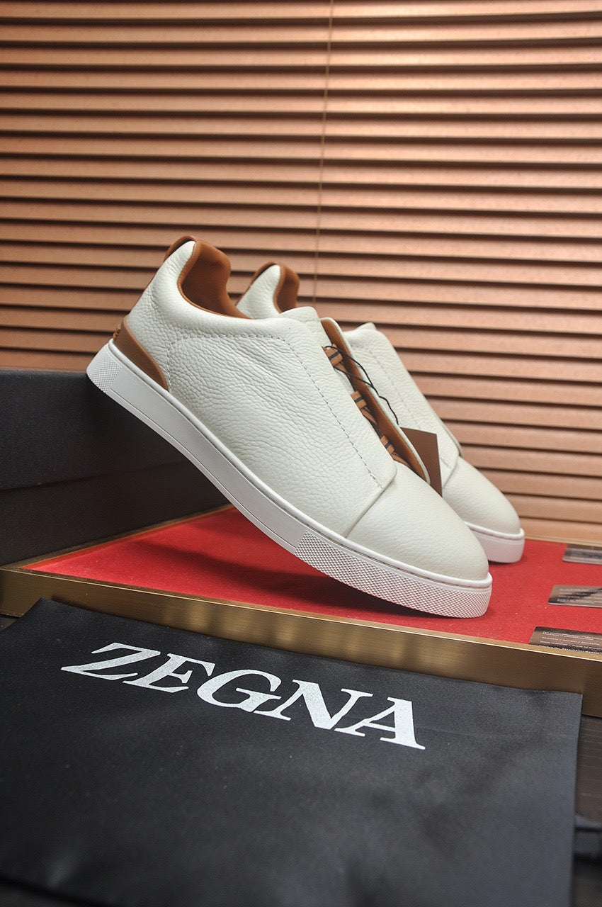 LOW-TOP SNEAKERS IN WHITE GRAINED CALFSKIN
