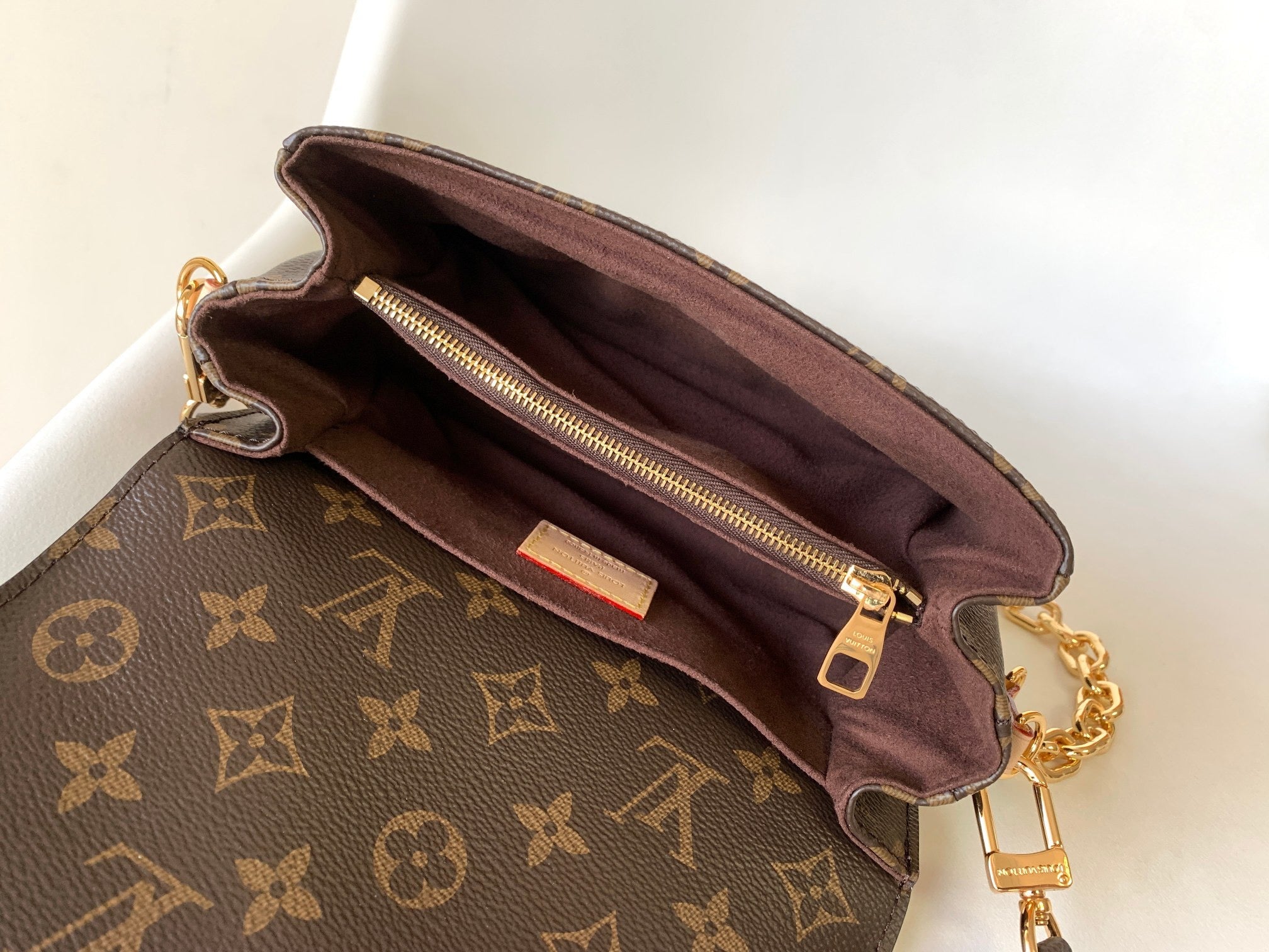 POCHETTE METIS EAST WEST 21.5 IN BROWN MONOGRAM CANVAS GOLD HARDAWARE