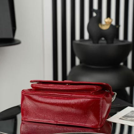 YSL MEDIUM NIKI BAG IN RED GLOSSY CALFSKIN AND HARDWARE