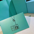 OPEN HEART LARIAT NECKLACE SILVER