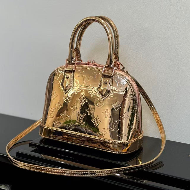 SPEEDY 23 IN GOLD MONOGRAM EMBOSSED CALFSKIN
