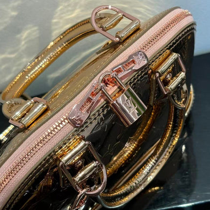 SPEEDY 23 IN GOLD MONOGRAM EMBOSSED CALFSKIN