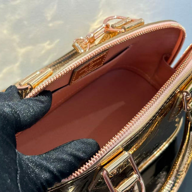SPEEDY 23 IN GOLD MONOGRAM EMBOSSED CALFSKIN