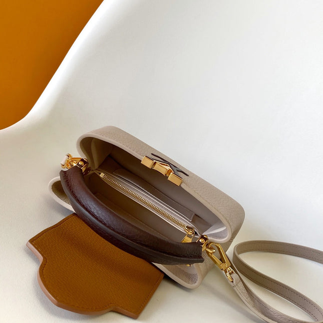 LV 26S CAPUCINES BAG 21 IN GRAYISH BEIGE TAURILLON CALFSKIN