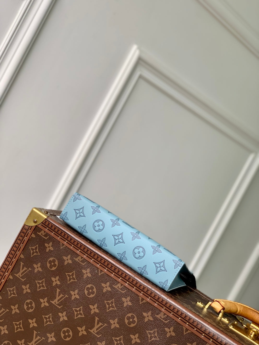 GASTON WEARABLE WALLET 22 IN SKY BLUE MONOGRAM SHADOW CALFSKIN EMBOSSED LOGO