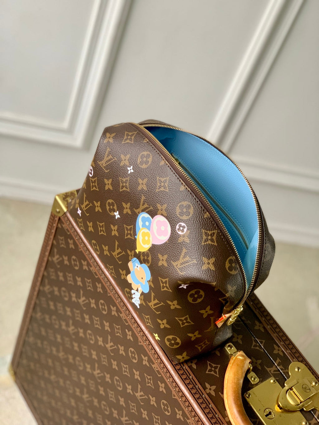 VIVIENNE 27 IN BROWN MONOGRAM COATED CANVAS GOLD LOCK