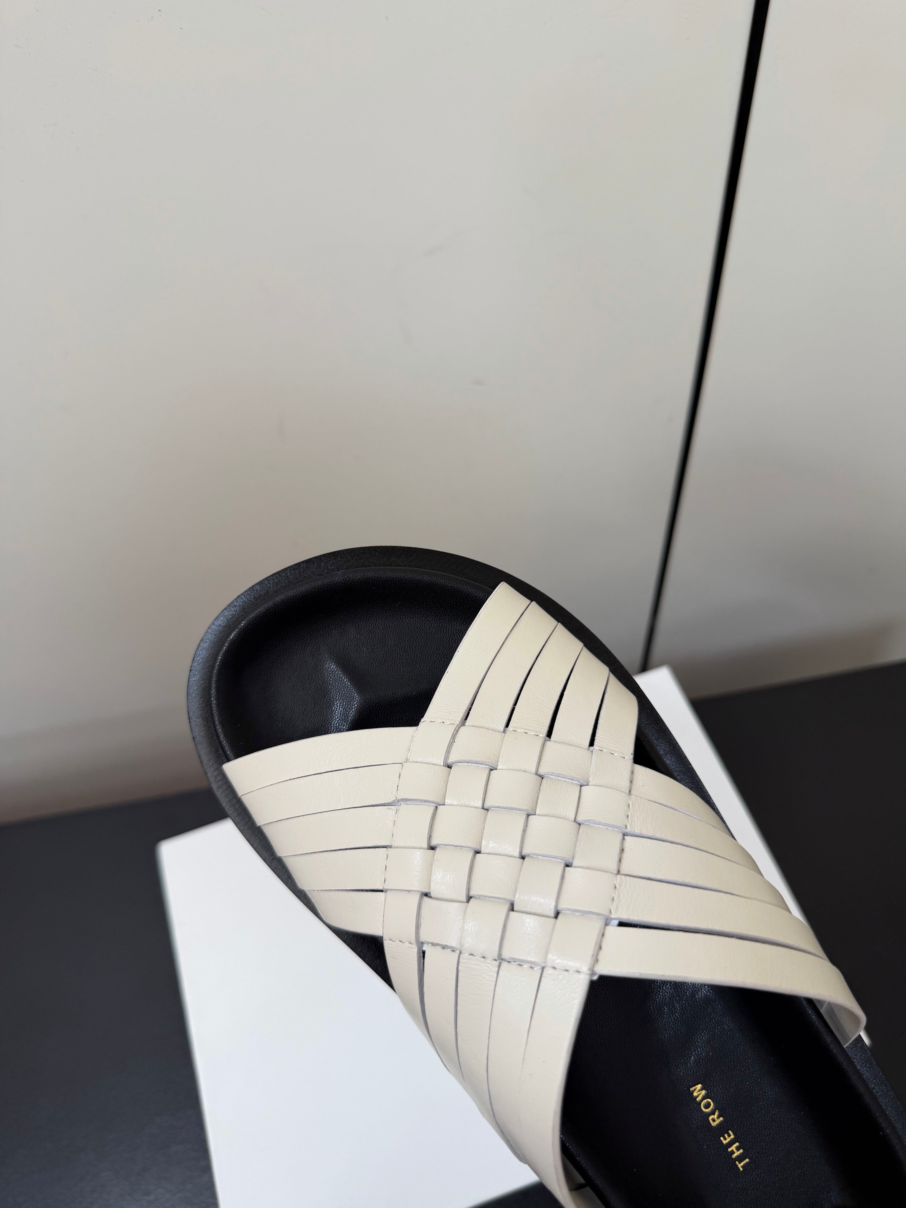 THE ROW 26S CROSS STRAP SANDALS IN IVORY WHITE CALFSKIN