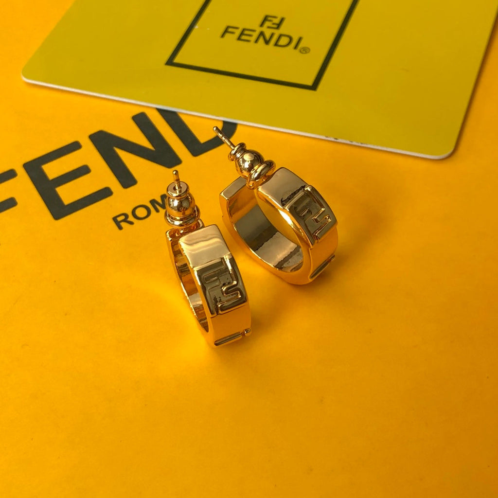 FENDI 26S FF LOGO HUGGIE HOOP EARRINGS IN GOLD TONE METAL 635065