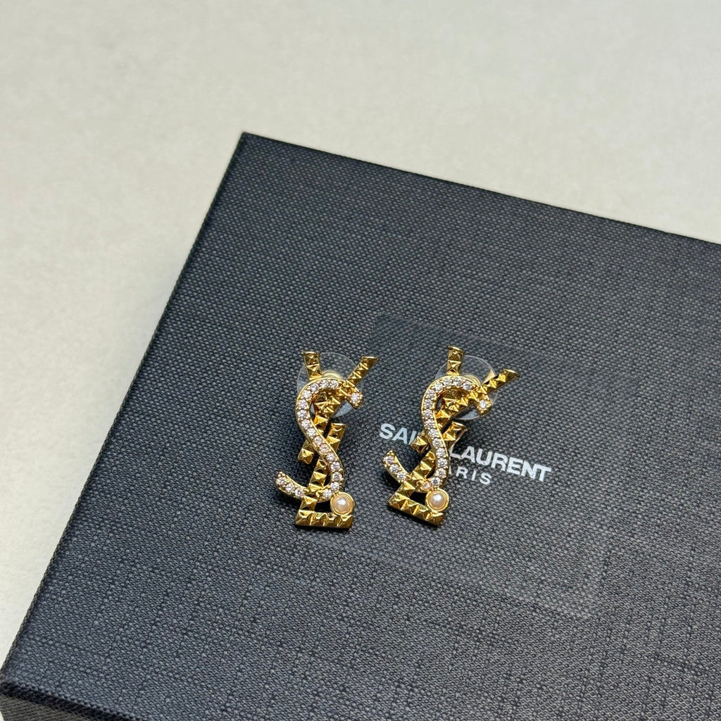YSL 26S STUDDED CRYSTAL PEARL LOGO EARRINGS IN GOLD TONE METAL 629138