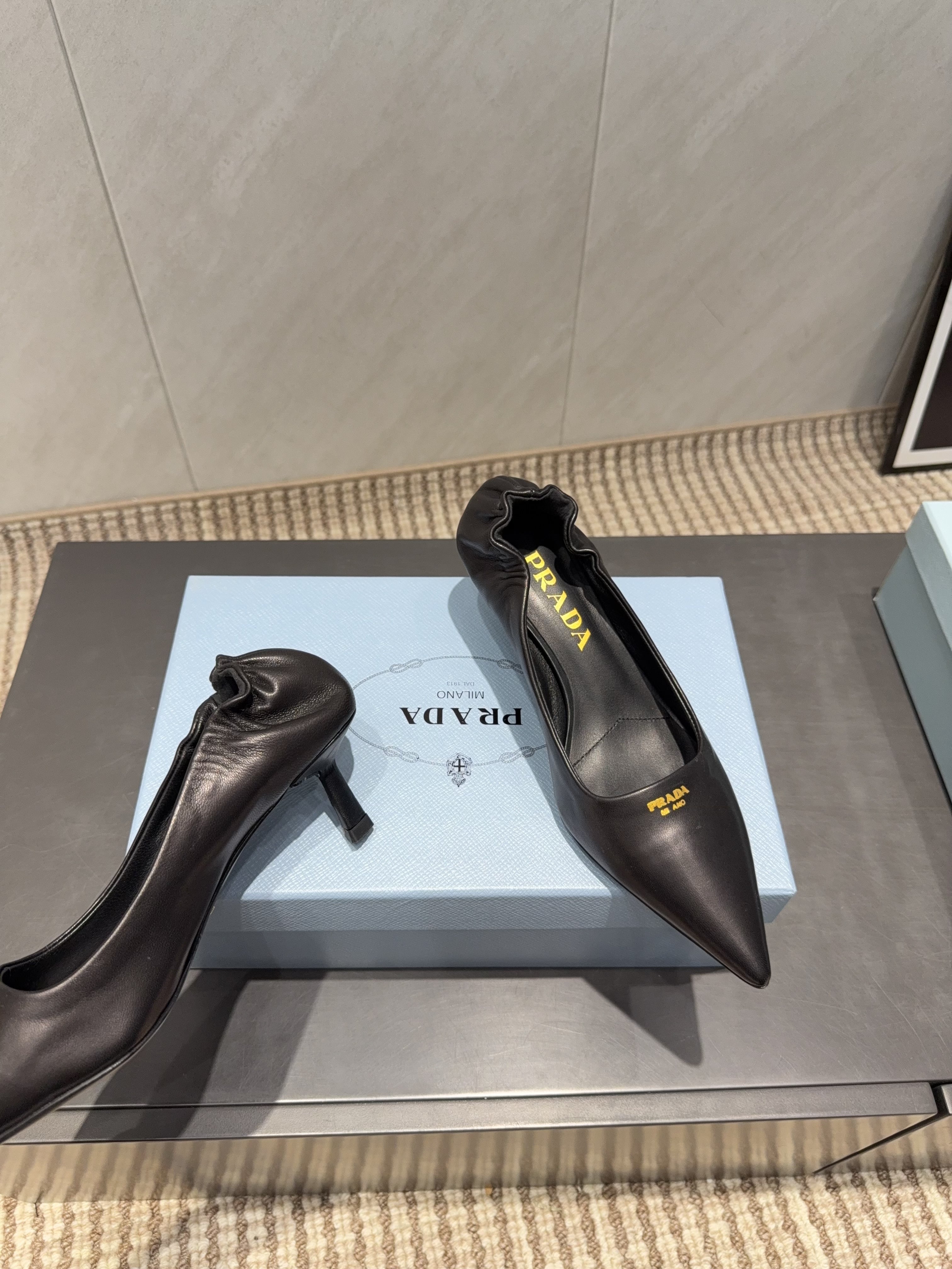 PRADA 26S POINTED TOE PUMPS 55MM IN BLACK SHEEPSKIN WITH LOGO
