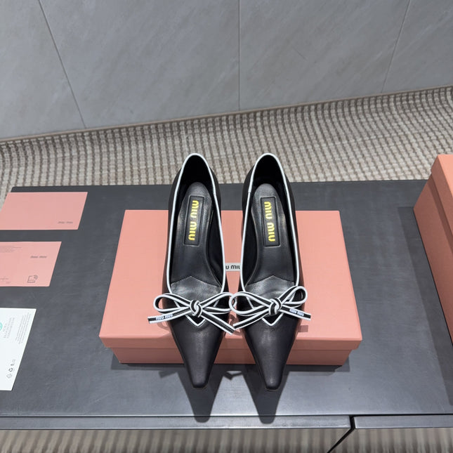 MIUMIU 26S POINTED TOE PUMPS 55MM IN BLACK AND WHITE CALFSKIN WITH BOW