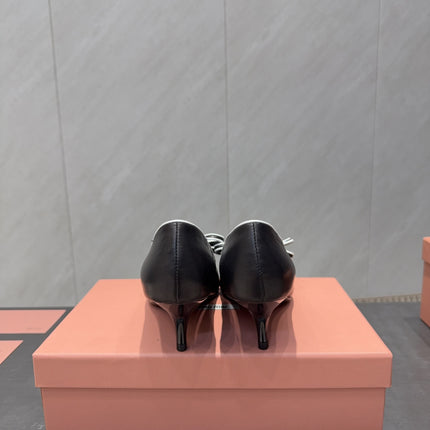 MIUMIU 26S POINTED TOE PUMPS 55MM IN BLACK AND WHITE CALFSKIN WITH BOW