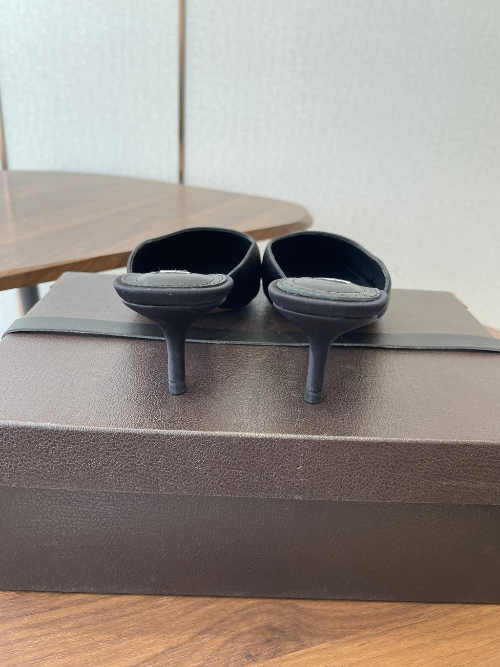 ALAIA 26S HEELED MULES 50 MM IN BLACK FABRIC