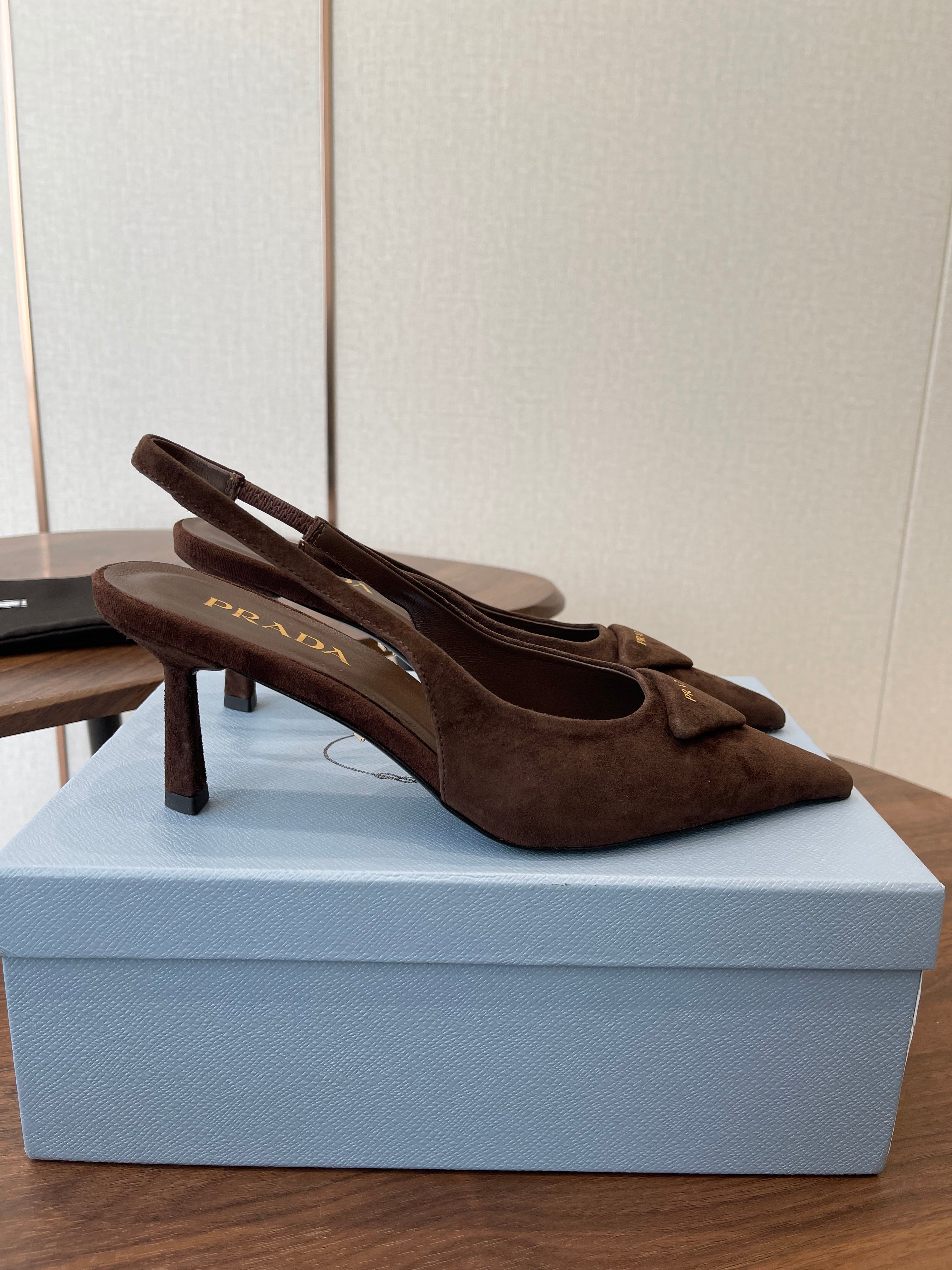 PRADA 26S SLINGBACK PUMPS 75MM IN DARK BROWN SUEDE WITH LOGO