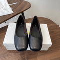 THE ROW 26S FLATS IN BLACK CALFSKIN