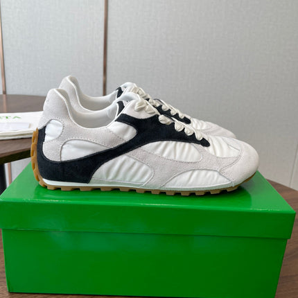 BOTTEGA VENETA 26S ORBIT FLASH SNEAKERS IN WHITE AND BLACK SUEDE