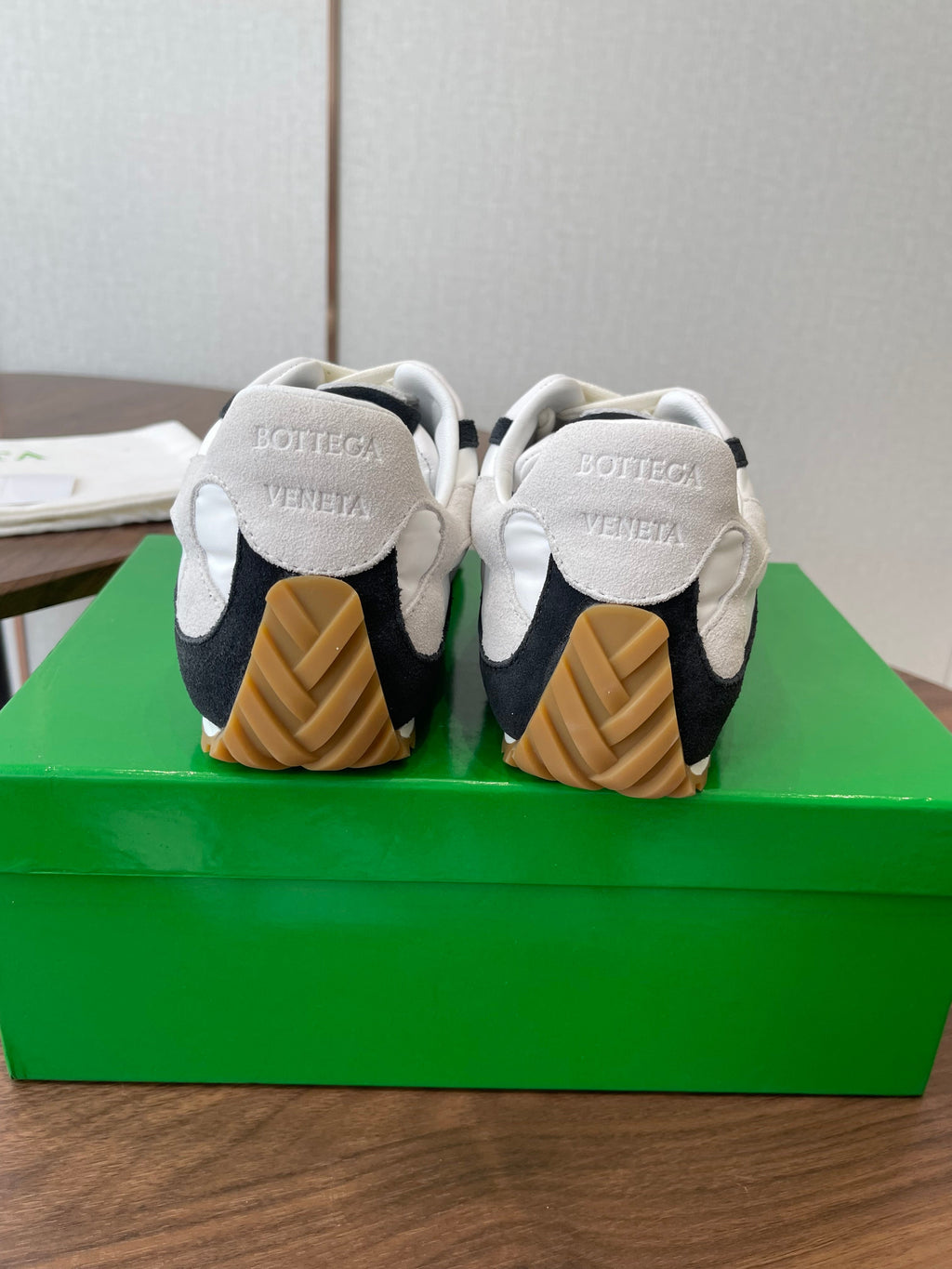 BOTTEGA VENETA 26S ORBIT FLASH SNEAKERS IN WHITE AND BLACK SUEDE
