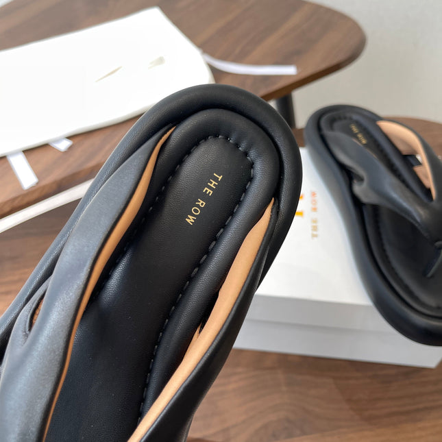 THE ROW 26S PUFFED THONG SANDALS IN BLACK CALFSKIN